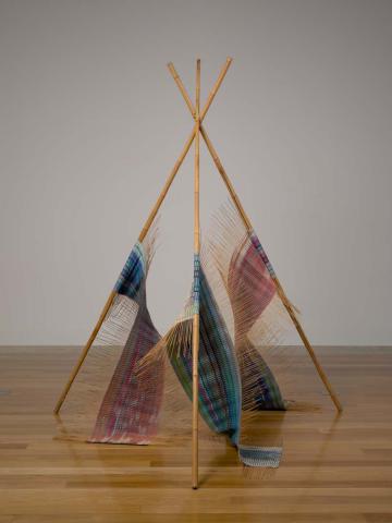 Artwork Construction: Teepee Whirl this artwork made of Woven bamboo, rayon, wool and linen thread with bamboo support in three sections, created in 1982-01-01