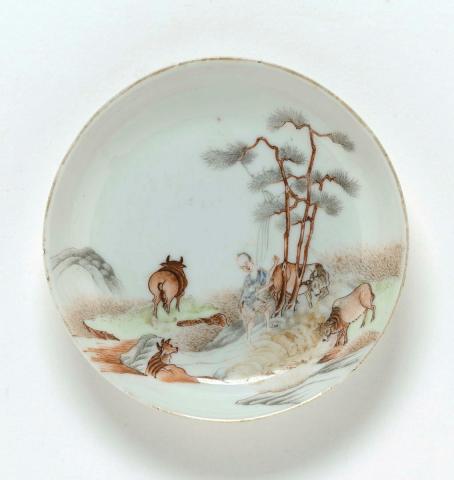 Artwork Saucer this artwork made of Hard-paste porcelain decorated in green, brown, black and blue, created in 1850-01-01