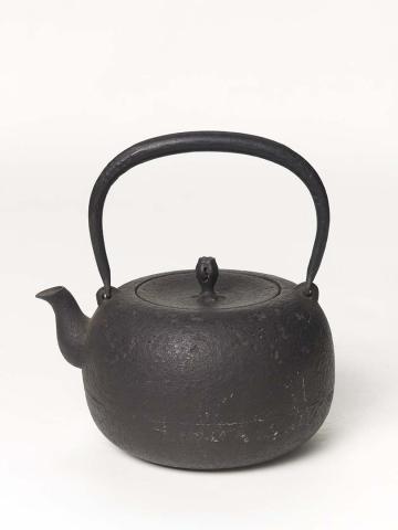 Artwork Teapot this artwork made of Black cast iron globular shape
