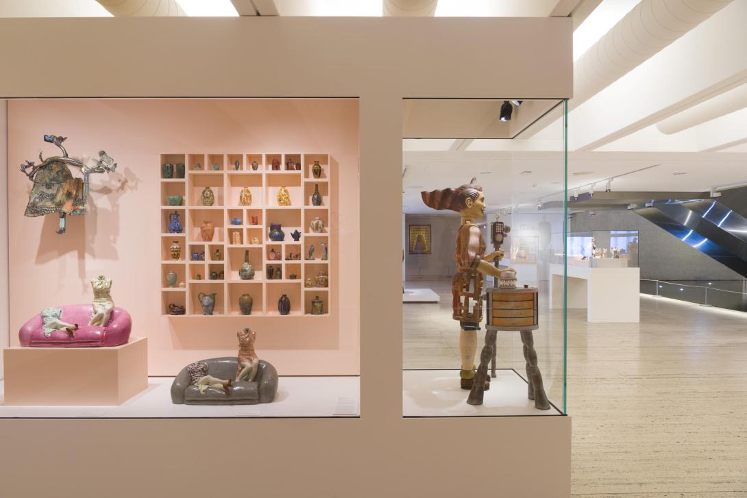 An installation view of a bright gallery space with sculptural works on display.