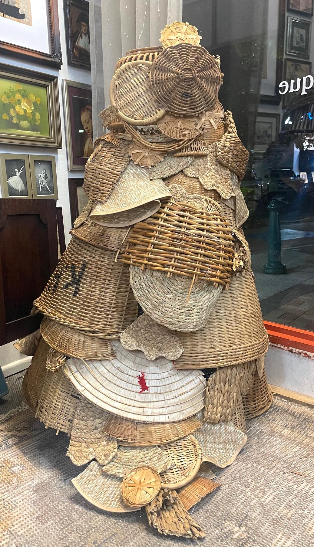 Artwork Basket Full this artwork made of Baskets and woven placemats, wire