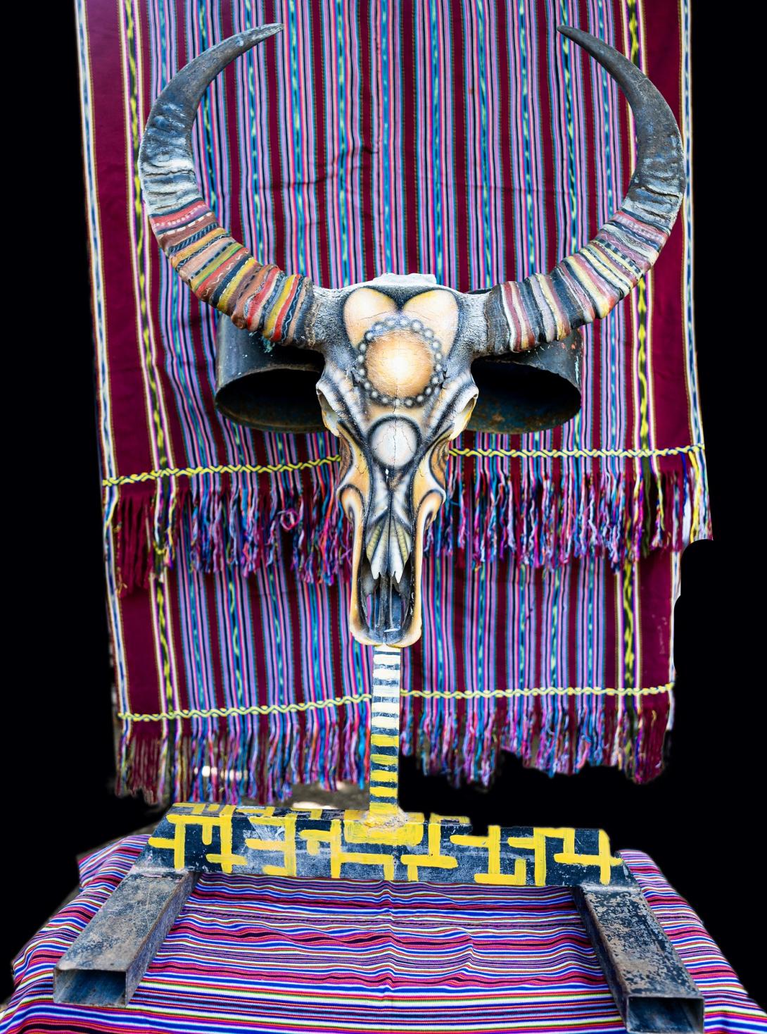 Artwork Buffalo skull and horn  this artwork made of Buffalo skull, horn, synthetic polymer paint on metal stand 