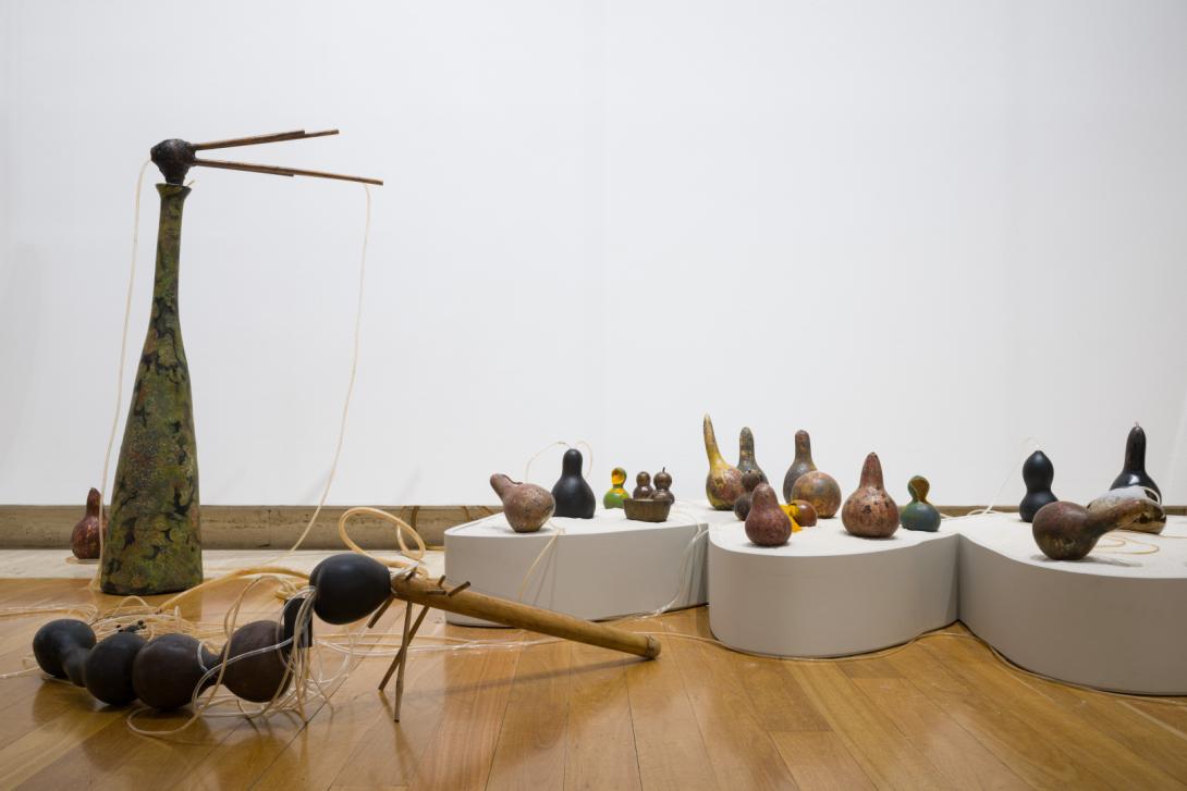 A view of an installation of curious objects and assemblages forming an abstract 'garden'