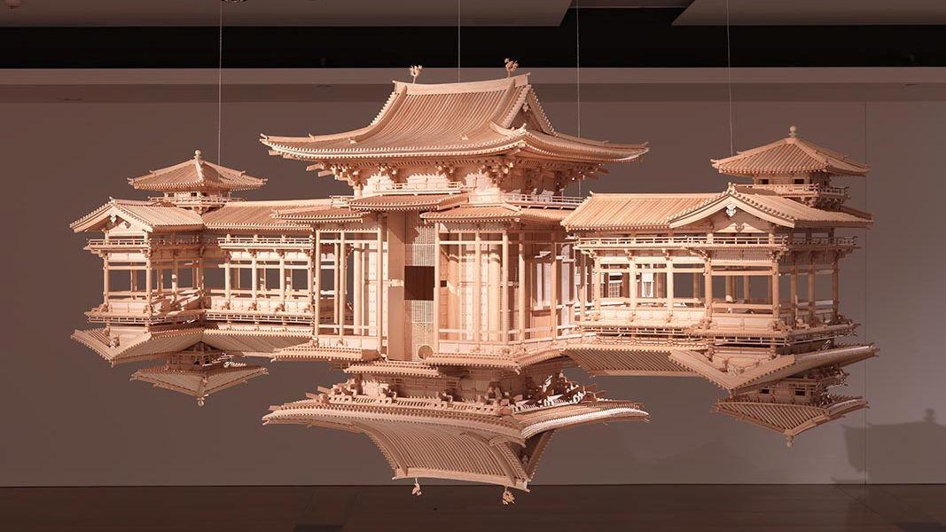 An installation view of an architectural sculpture of a Japanese temple, which is doubled as if we can see its reflection underneath