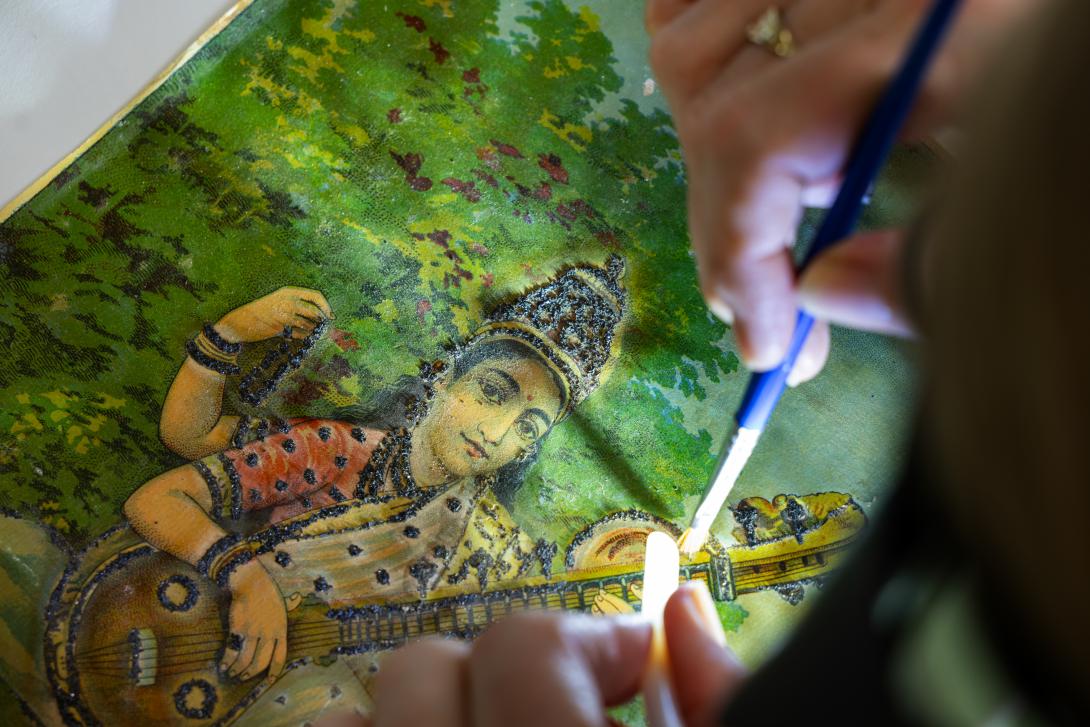 An oleograph print of a work by Raja Ravi Varma 