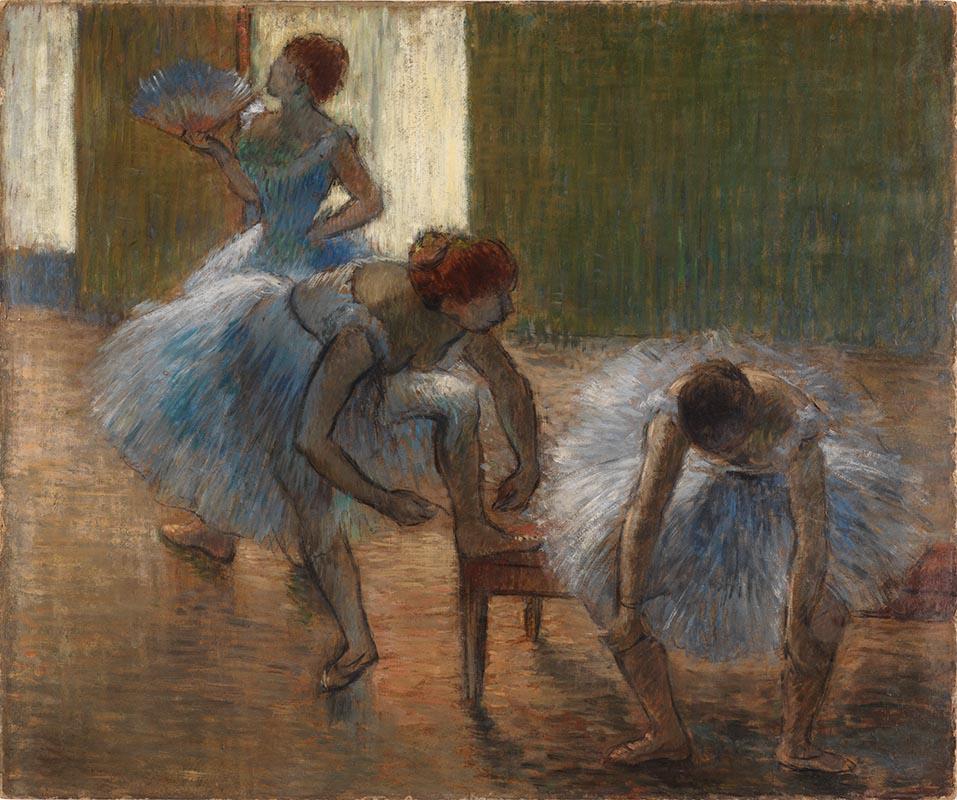 Artwork Trois danseuses a la classe de danse (Three dancers at a dance class) this artwork made of Oil on cardboard, created in 1888-01-01