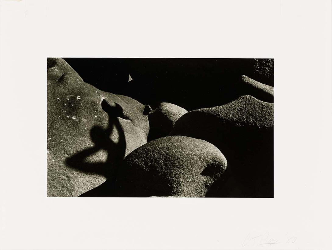 Artwork (Rocks with shadow of a figure) (from 'Magnetic Island' series) this artwork made of Gelatin silver photograph on paper, created in 1982-01-01