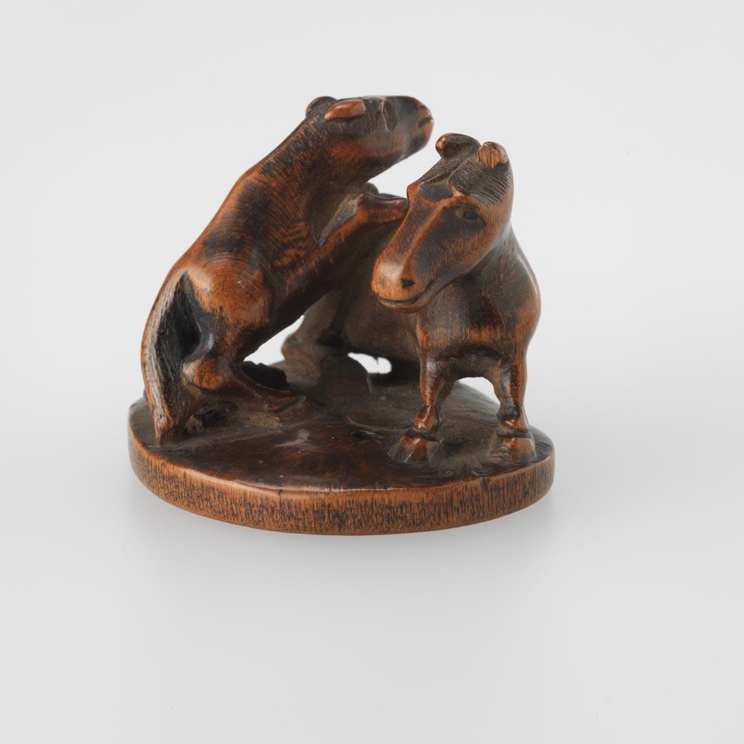 Artwork Netsuke:  (two horses) this artwork made of Carved boxwood on flat base, created in 1800-01-01