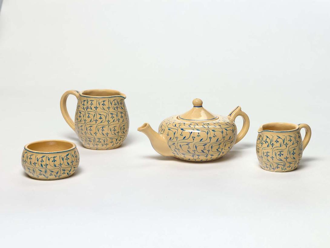 Artwork Tea-set this artwork made of Earthenware, hand-built cream Redcliffe clay decorated in blue underglaze with a trellis and cornflower pattern, created in 1928-01-01