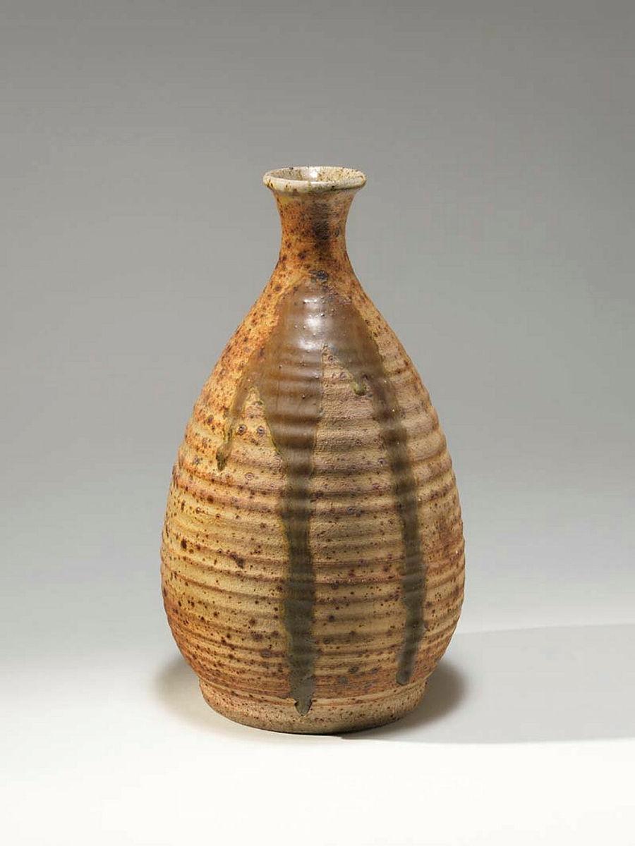 Artwork Bottle this artwork made of Stoneware, thrown tear drop shape with wreathing marks. Large calligraphic and poured marks with heavily speckled glaze, created in 1960-01-01