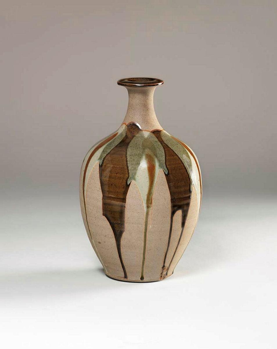 Artwork Bottle this artwork made of Stoneware, thrown baluster shape with tricolour poured glazes, created in 1978-01-01