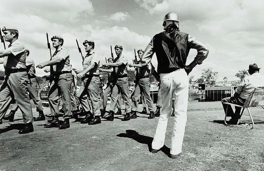 Artwork March past, Toowoomba (from 'Journeys north' portfolio) this artwork made of Gelatin silver photograph on paper, created in 1986-01-01