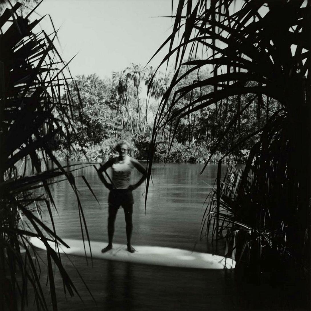 Artwork Man on surfboard, Lawn Hill National Park (from 'Journeys north' portfolio) this artwork made of Gelatin silver photograph on paper, created in 1986-01-01