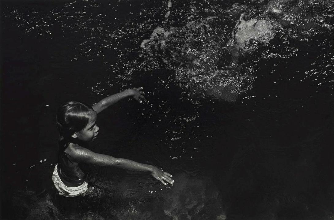 Artwork Girl swimming Yarrabah, NQ (from 'Journeys north' portfolio) this artwork made of Gelatin silver photograph on paper, created in 1986-01-01