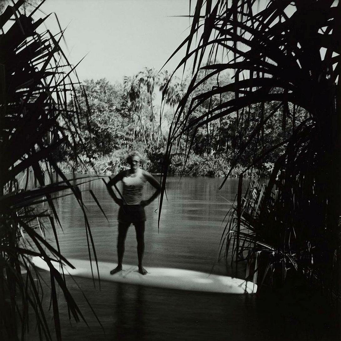 Artwork Man on surfboard, Lawn Hill National Park (from 'Journeys north' portfolio) this artwork made of Gelatin silver photograph on paper, created in 1986-01-01