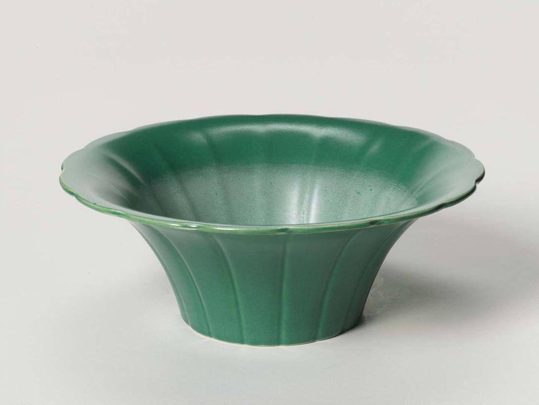Artwork Fluted bowl this artwork made of Earthenware, slip-cast, flaring fluted shape, with deep green glaze, created in 1932-01-01