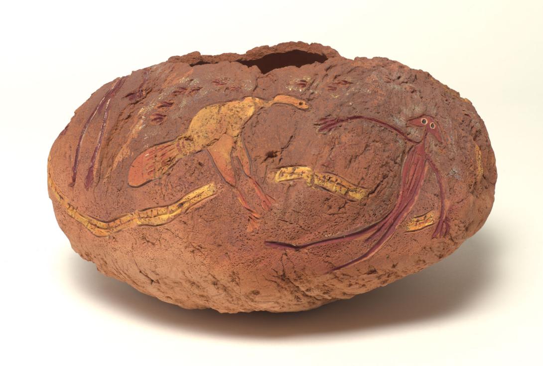 Artwork Rock art pot this artwork made of Earthenware, hand built, impressed with bark, incised and filled with ochre rust glazes, created in 1990-01-01