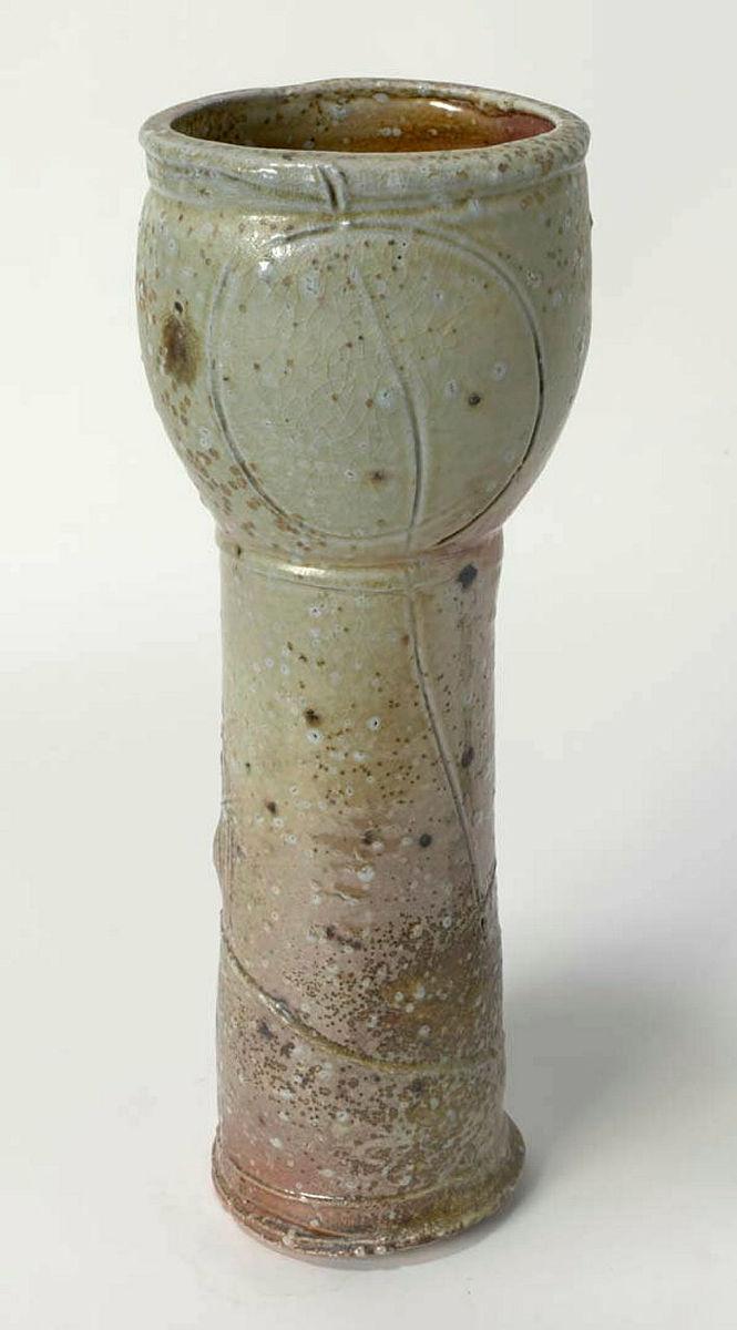 Artwork Vase:  Voco this artwork made of Stoneware, wheelthrown, local clays, incised, with soda Shino type glaze, wood fired in Anagama kiln, created in 1991-01-01