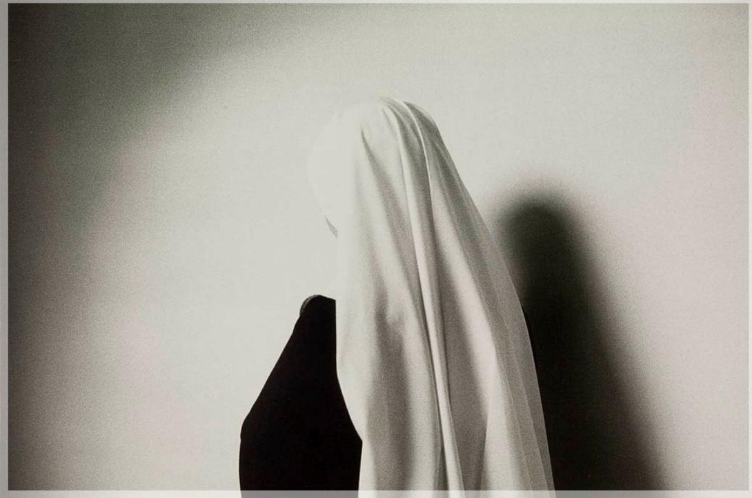 Artwork Untitled (The white veil of a novice) (from 'In the presence of angels - photographs of the contemplative life' series) this artwork made of Gelatin silver photograph on paper, created in 1988-01-01