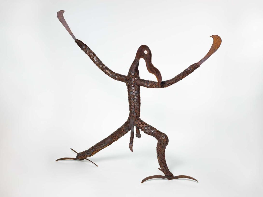 Artwork Machete man this artwork made of Steel, bitumen and limpet shell on wood, created in 1995-01-01
