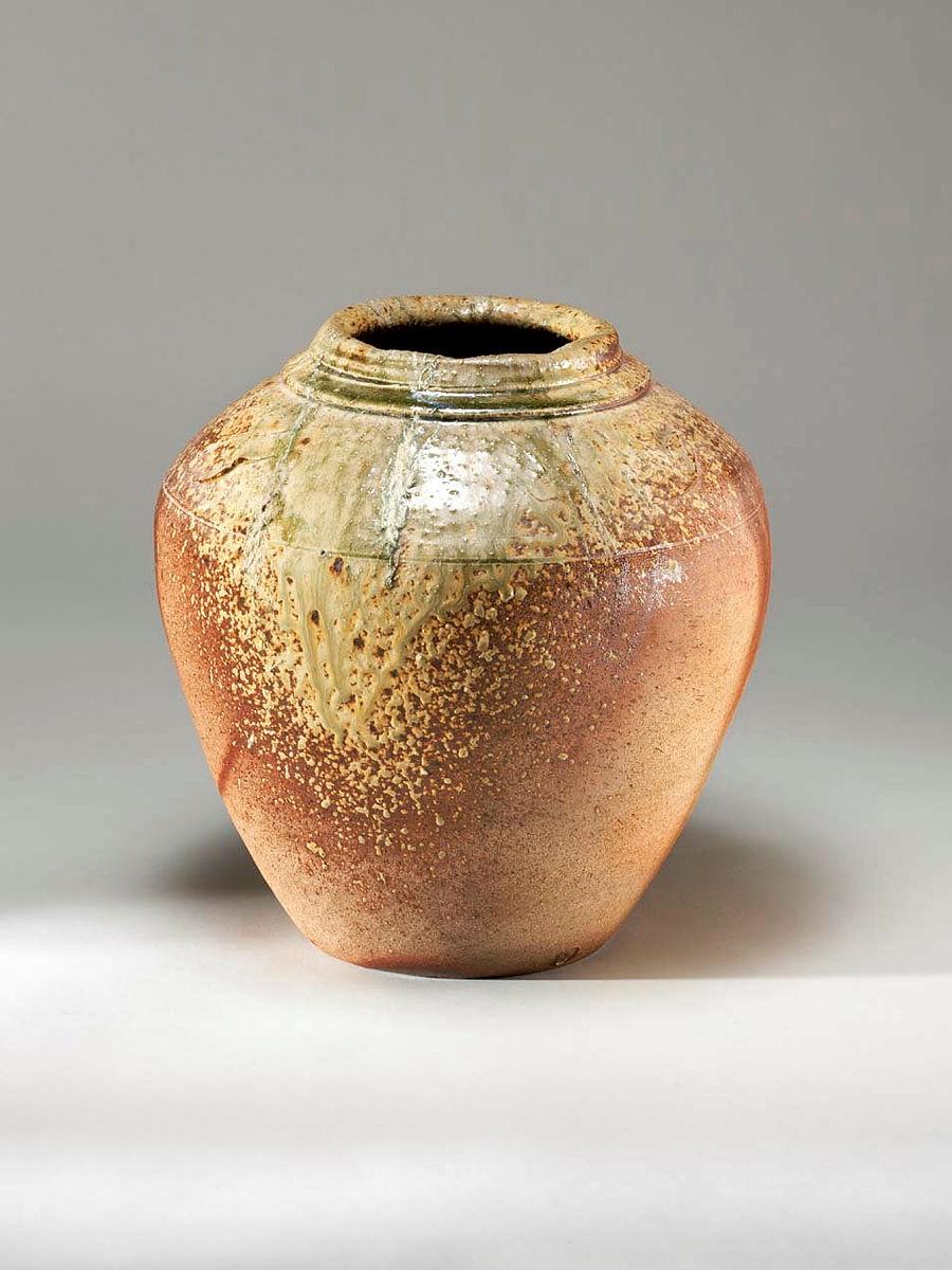 Artwork Pot with ash glaze this artwork made of Stoneware, wheelthrown, incised base at shoulder with firemarks, ash glaze and kiln deposit, created in 1975-01-01