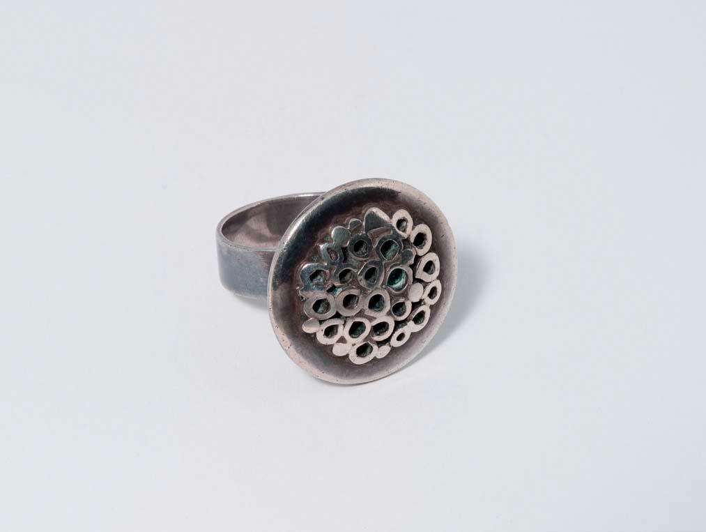 Artwork Ring: (disc) this artwork made of Sterling silver, created in 1973-01-01