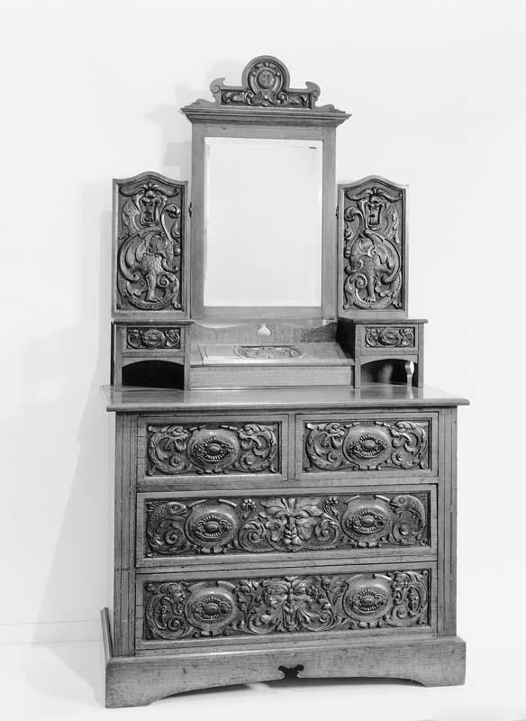 Artwork Dressing chest this artwork made of Carved silky-oak with metal handles, created in 1906-01-01