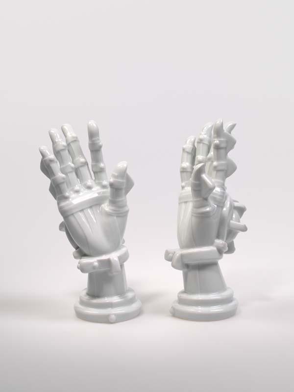Artwork Untitled (Cyborg hands) this artwork made of Hard-paste porcelain, slip-cast, fired to 1555 degrees Celsius and with clear glaze