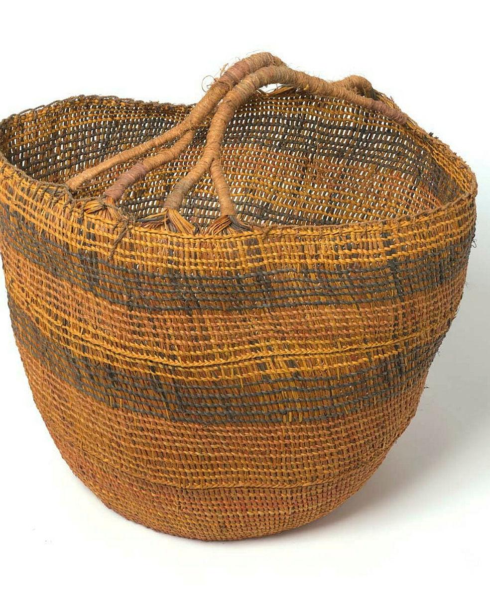 Artwork Large basket this artwork made of Twined pandanus (Pandanus spiralis) fibre with raised stitch, natural dyes and coiled pandanus fibre/string handle, created in 1997-01-01
