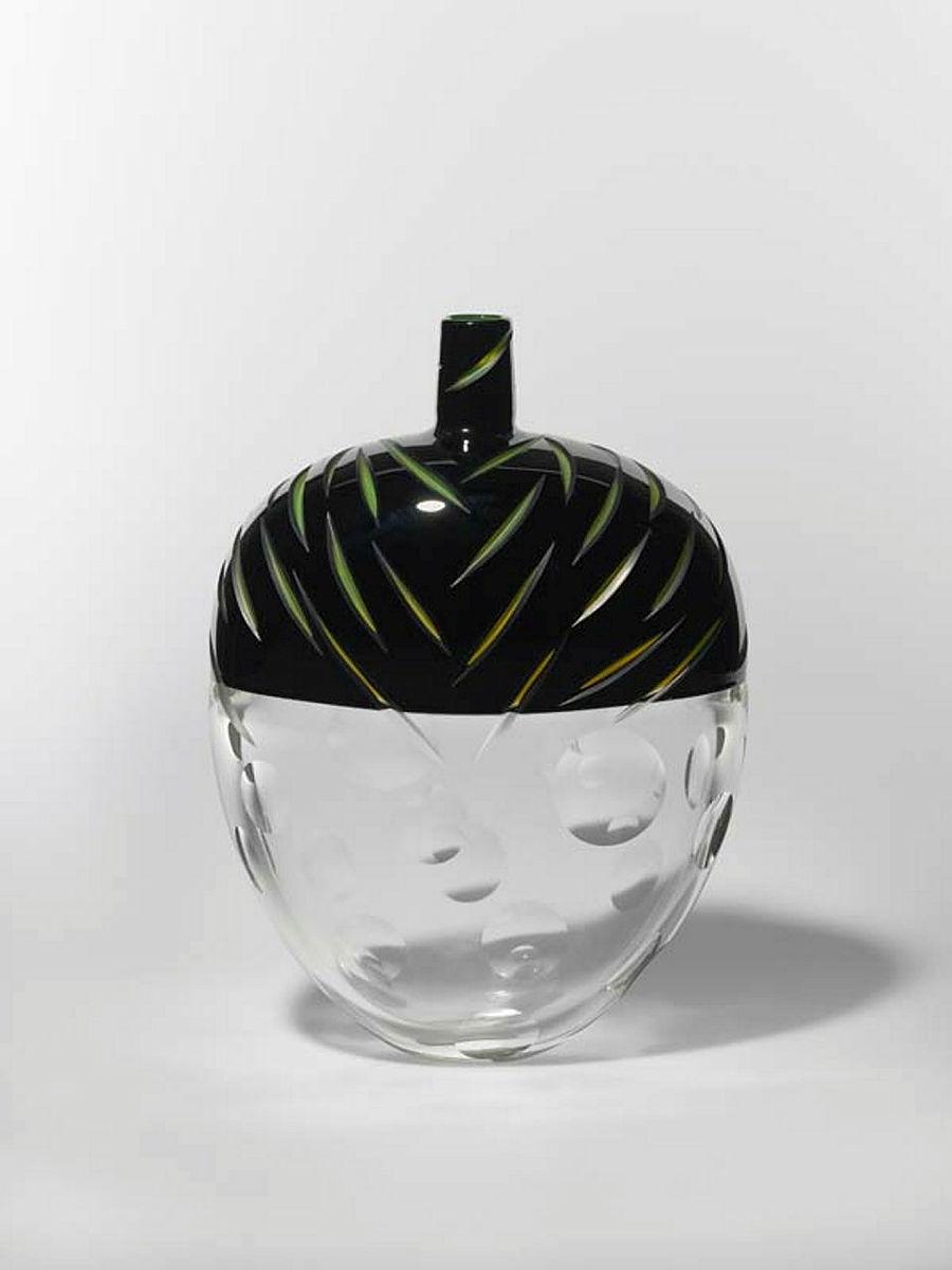 Artwork Black/fluoro/clear 'lidded' vessel this artwork made of Glass, cased fluoro and black over clear and wheelcut with optical circles, created in 2001-01-01