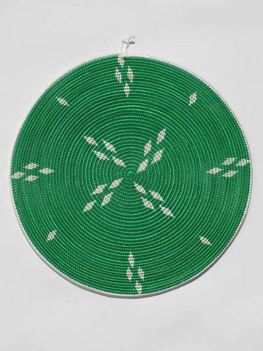 Artwork Round mat this artwork made of Woven raffia over coconut midrib, created in 2003-01-01