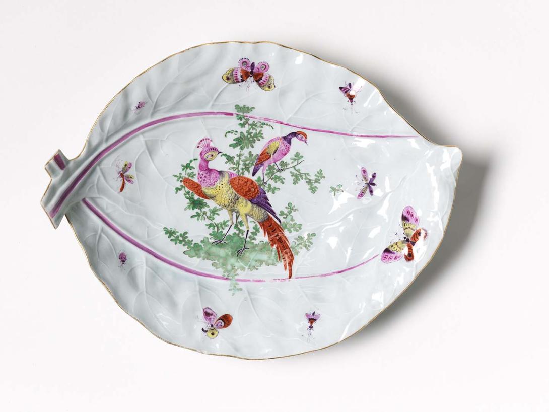 Artwork Leaf dish: (fancy birds) this artwork made of Porcelain, soft-paste press-moulded, with birds and butterflies in polychrome colours over blue glaze. Gilt details, created in 1770-01-01