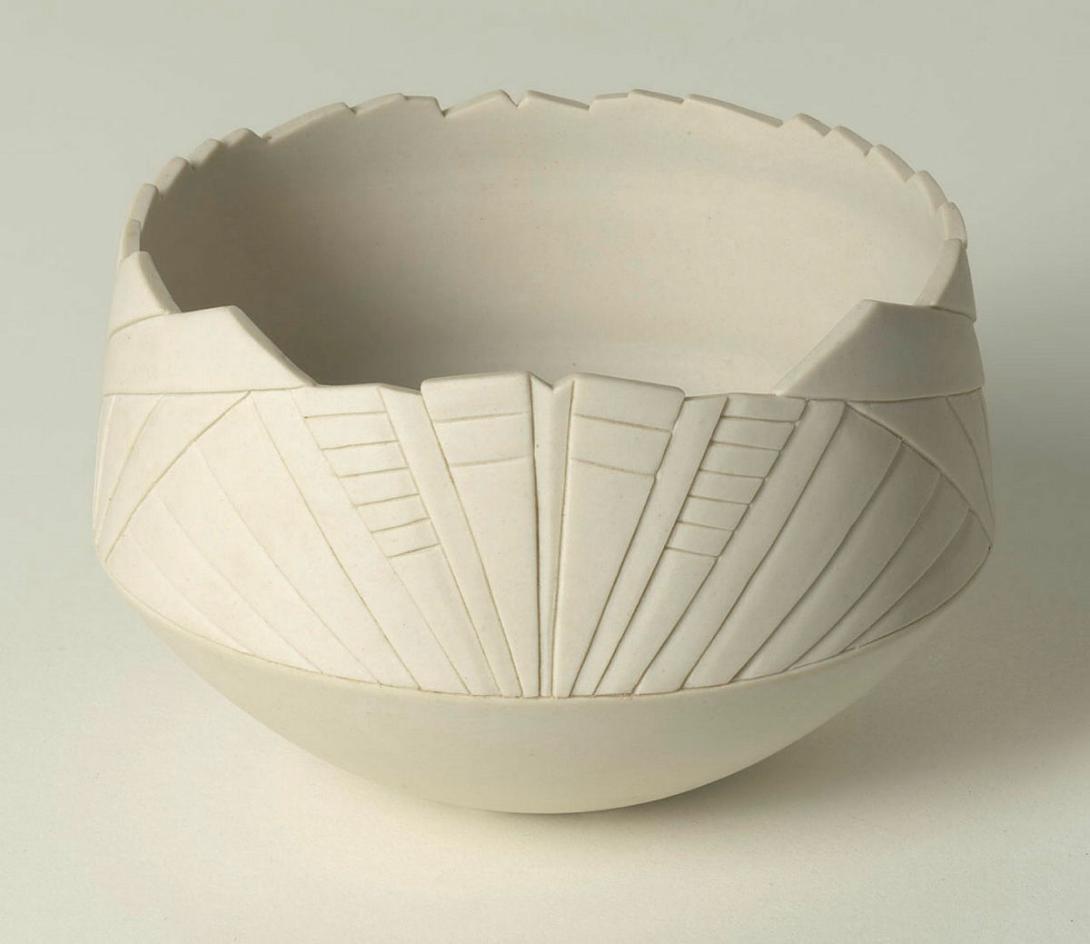 Artwork Carved bowl this artwork made of Stoneware, wheelthrown white clay carved with art deco designs, unglazed, created in 1984-01-01