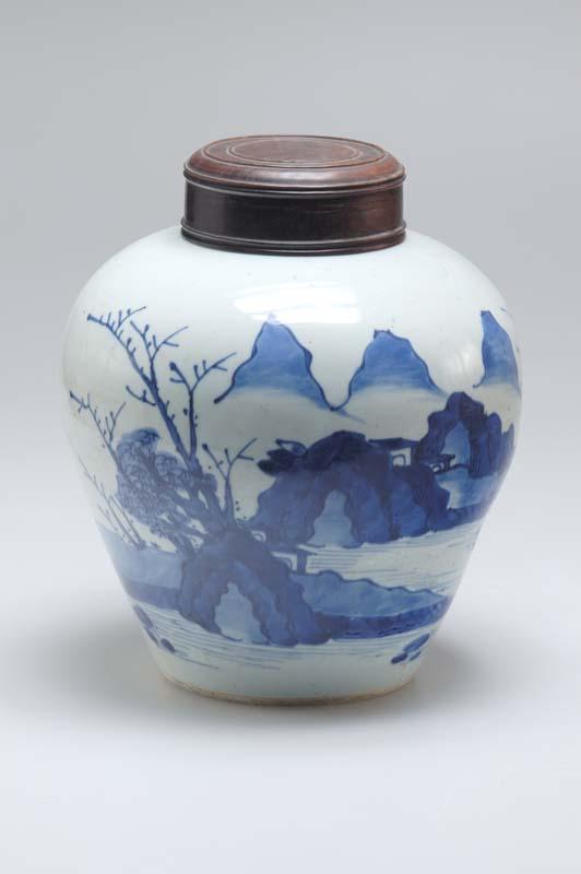 Artwork Jar this artwork made of White porcelain baluster form with short neck rising from rounded shoulders, with cobalt oxide underglaze design of mountainous landscape with lake, trees and buildings under a full moon; replacement rosewood lid, created in 1780-01-01