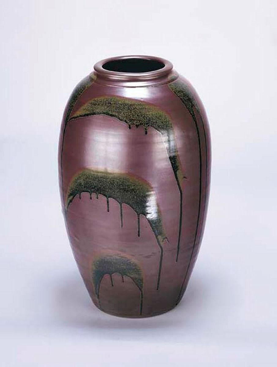Artwork Large vase with 'Pinjarra plum' glaze this artwork made of Stoneware, wheelthrown with 'Pinjarra plum' glaze and poured decoration, created in 1979-01-01