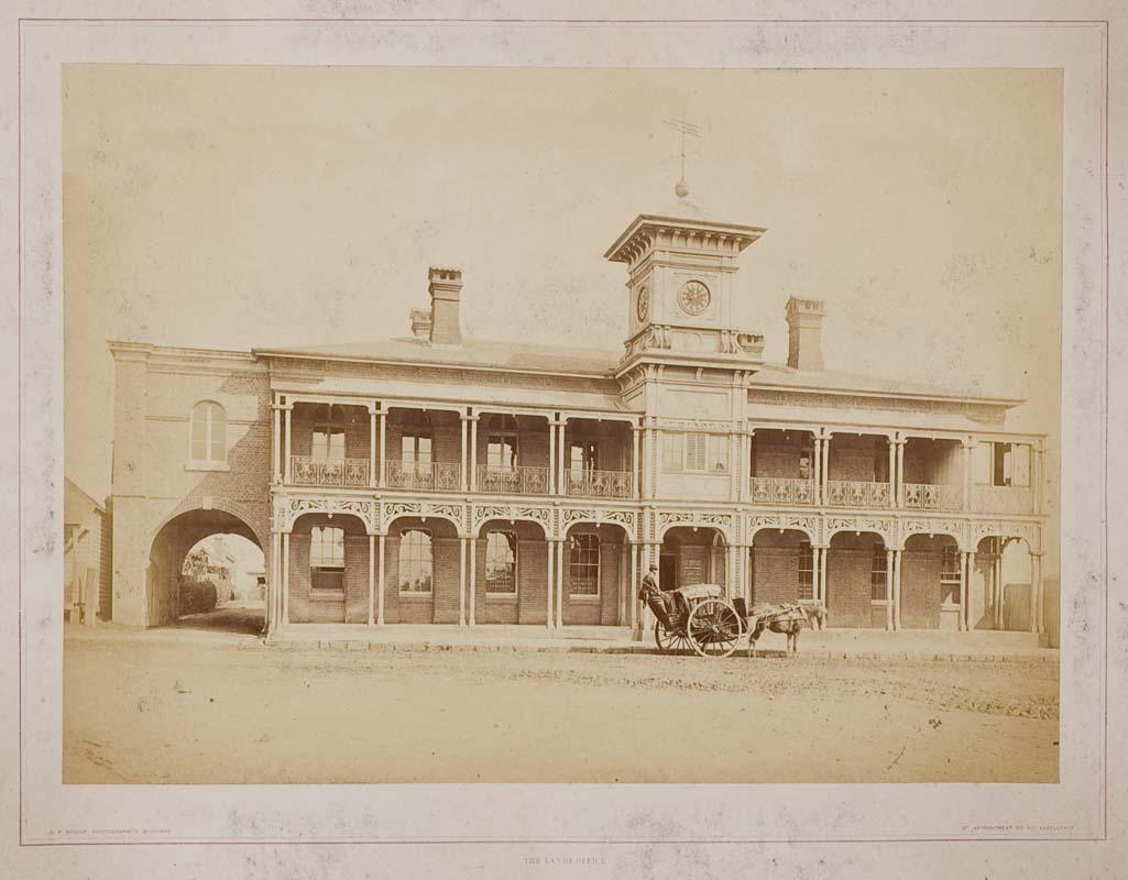 Artwork The Lands Office (from 'Brisbane illustrated' portfolio) this artwork made of Albumen photograph on paper mounted on card, created in 1874-01-01