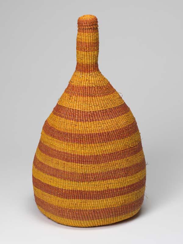 Artwork Woven bottle this artwork made of Twined pandanus with natural dyes, created in 2005-01-01