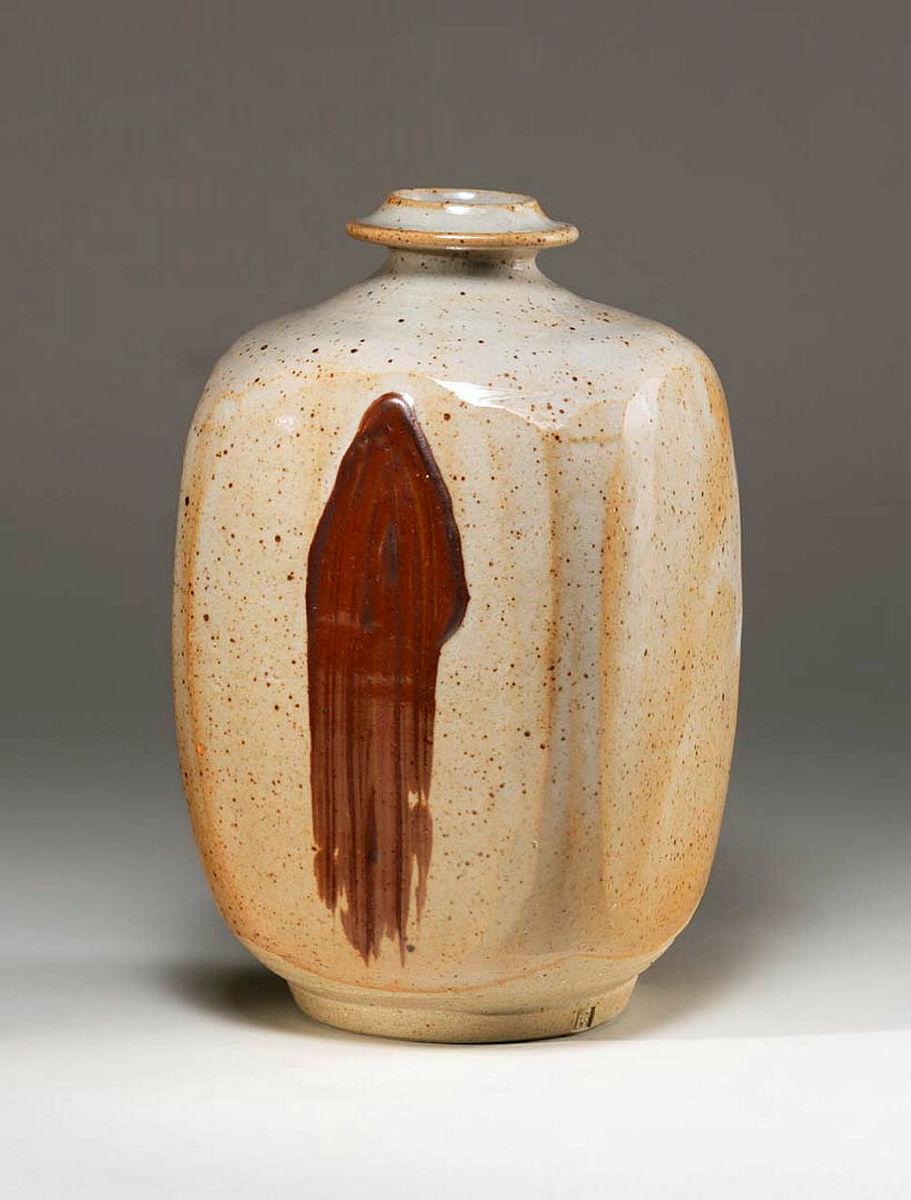Artwork Square bottle this artwork made of Stoneware, wheelthrown with battered faces and limestone glaze and trailed iron oxide slip, created in 1970-01-01