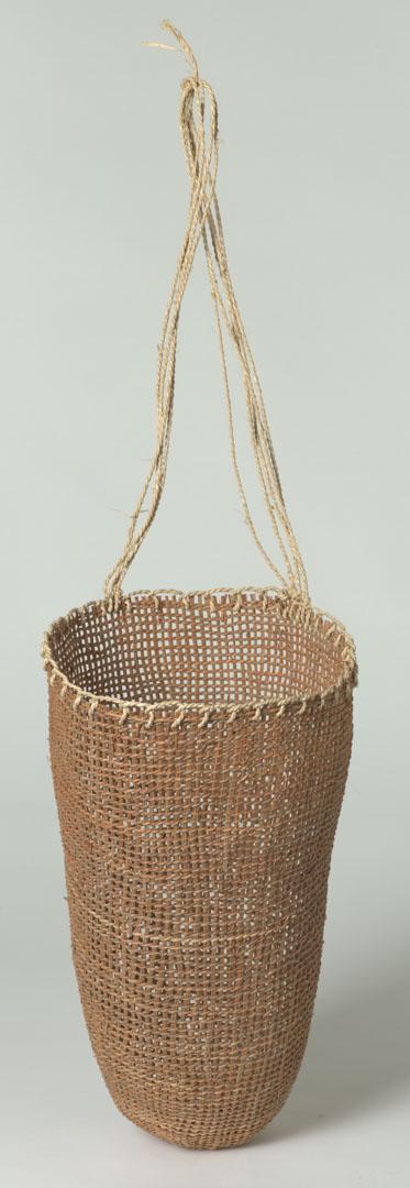 Artwork Mewana (Conical grass basket) this artwork made of Twined sedge grass (Cyperus sp.) with bark fibre string, created in 2007-01-01