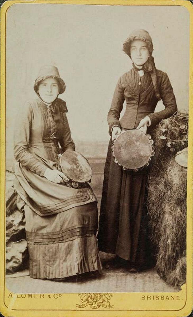 Artwork (Two women dressed in Salvation Army attire) this artwork made of Albumen photograph on paper mounted on card, created in 1874-01-01