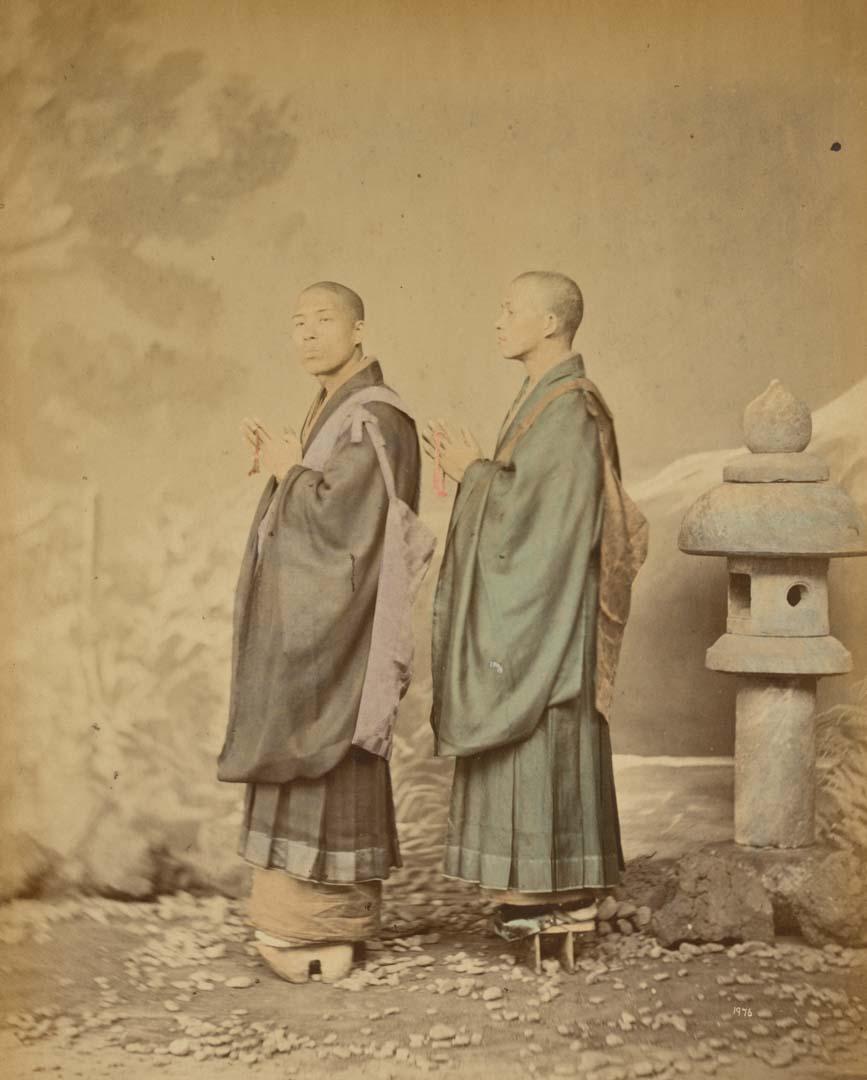Artwork (Buddhist priests) (from 'Japan' album) this artwork made of Hand-coloured albumen photograph on board (originally bound in an album), created in 1867-01-01