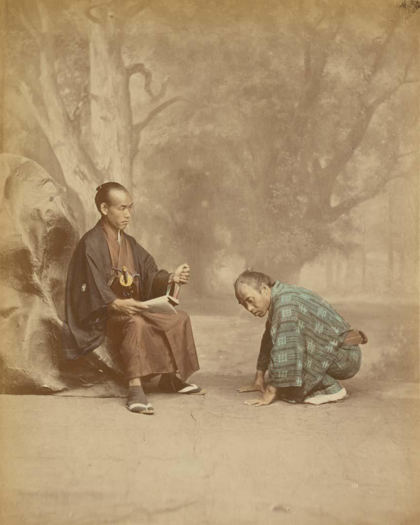 Artwork (Master and servant) (from 'Japan' album) this artwork made of Hand-coloured albumen photograph on board (originally bound in an album), created in 1870-01-01