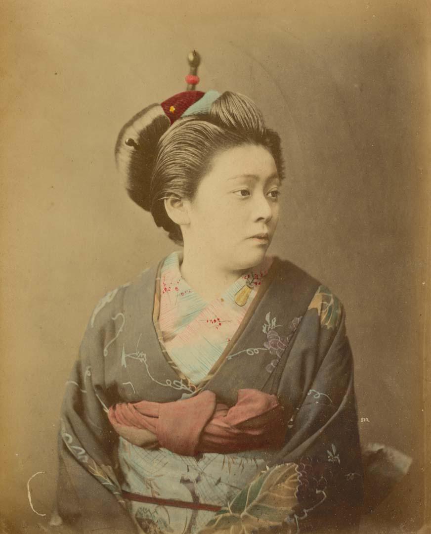 Artwork (Geisha) (from 'Japan' album) this artwork made of Hand-coloured albumen photograph on board (originally bound in an album), created in 1870-01-01