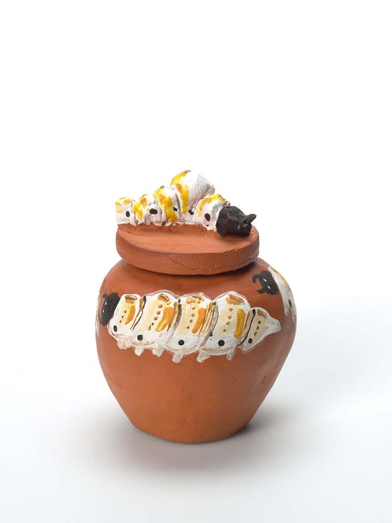Artwork Tjaapa tnyamaatja (witchetty grubs) (from 'Bush tucker' series) this artwork made of Earthenware, hand-built terracotta clay with underglaze colours and applied decoration, created in 2009-01-01