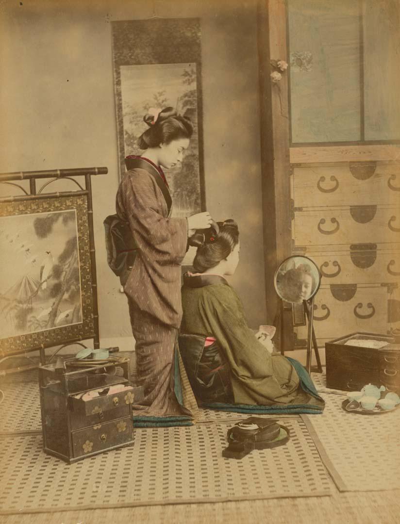 Artwork Hairdresser this artwork made of Vintage hand-coloured albumen photograph mounted on board, created in 1870-01-01