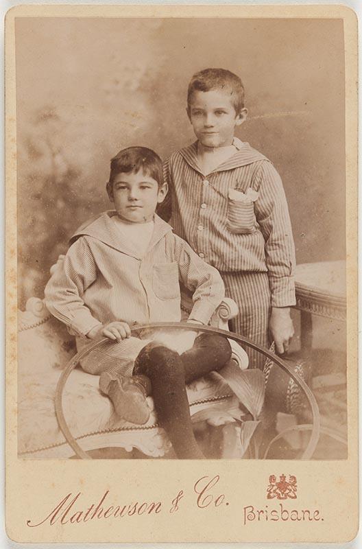 Artwork (Young boys with a hoop) this artwork made of Albumen photograph on paper mounted on card