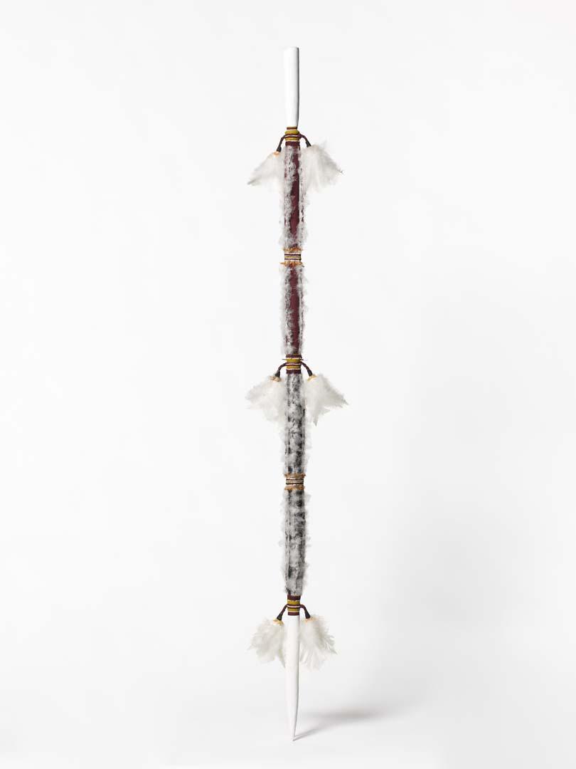 Artwork Digging stick (Wapitja) this artwork made of Wood, commercial feathers, feathers, synthetic polymer paint, created in 1999-01-01