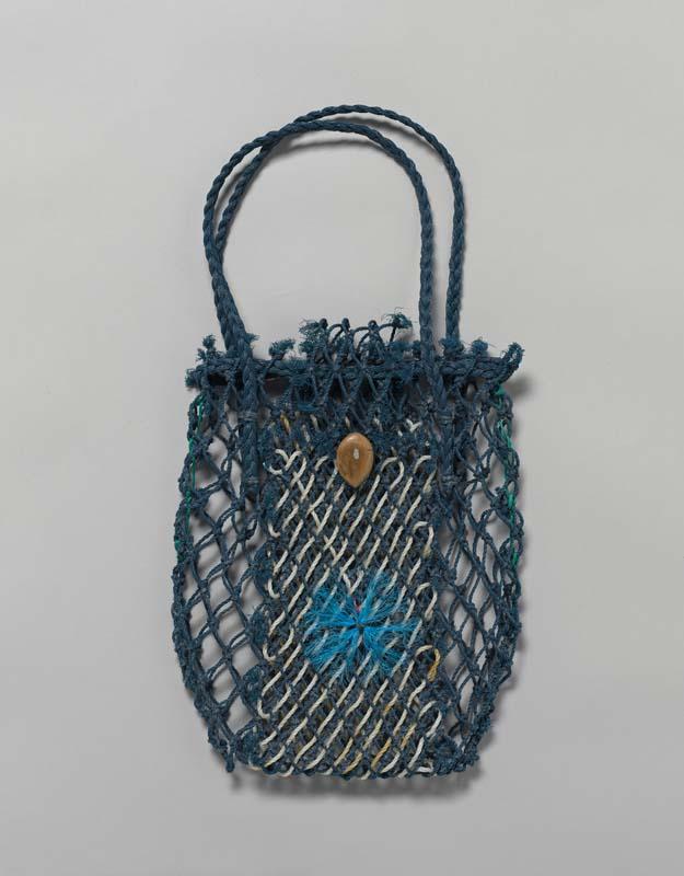 Artwork Ghost net gear bag with seed this artwork made of Woven reclaimed acrylic fishing net, seed, created in 2009-01-01