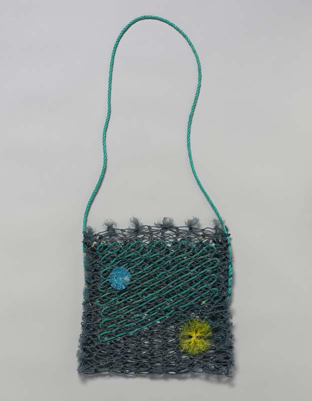 Artwork Ghost net gear bag (yellow and blue flower) this artwork made of Woven reclaimed acrylic fishing net, created in 2009-01-01