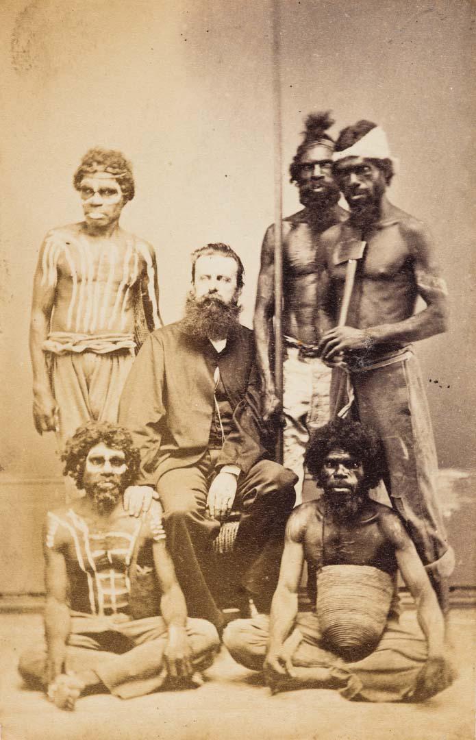 Artwork Dr JF Berini with Queensland Aboriginal men this artwork made of Albumen photograph mounted on card, created in 1869-01-01